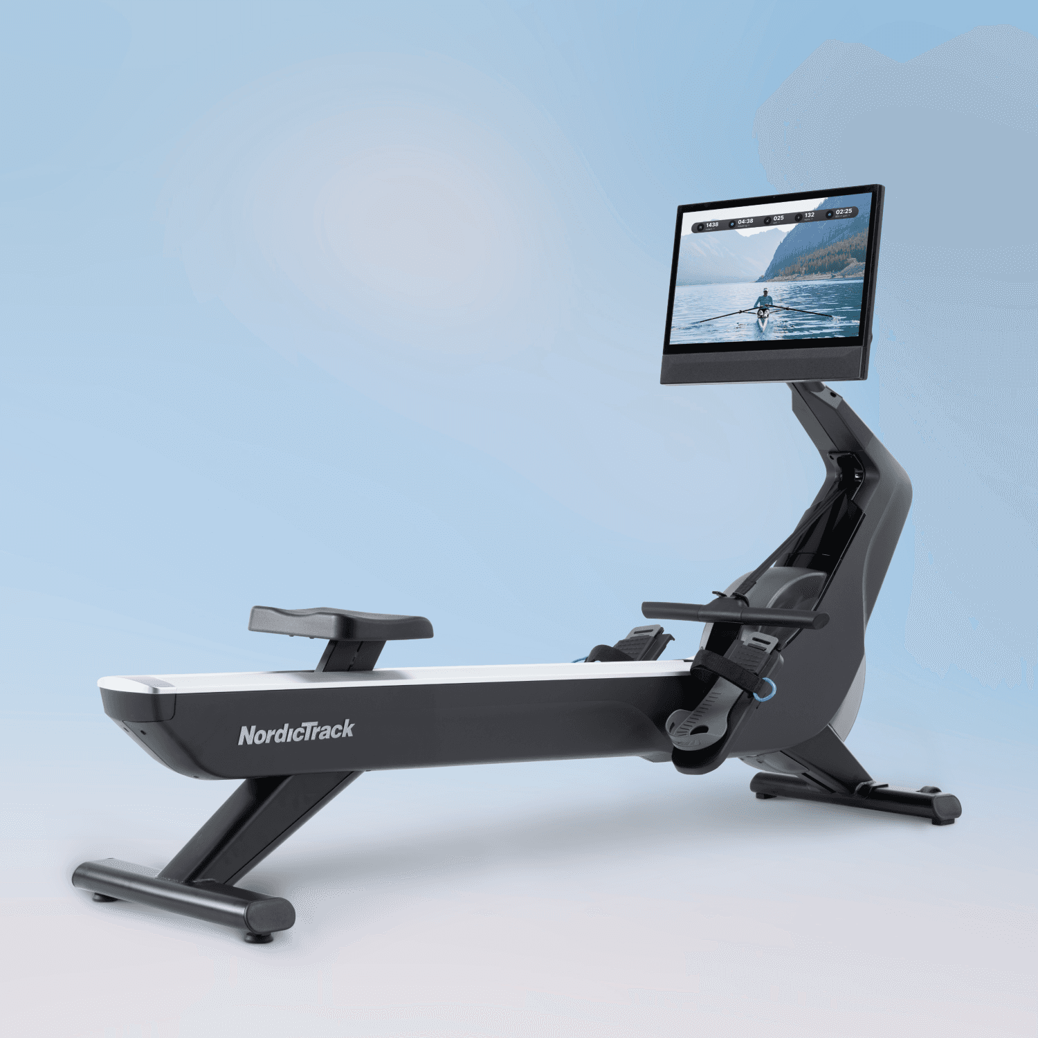 The RW900 Rower on a blue backdrop showcasing winter workout content on its 24" touchscreen.